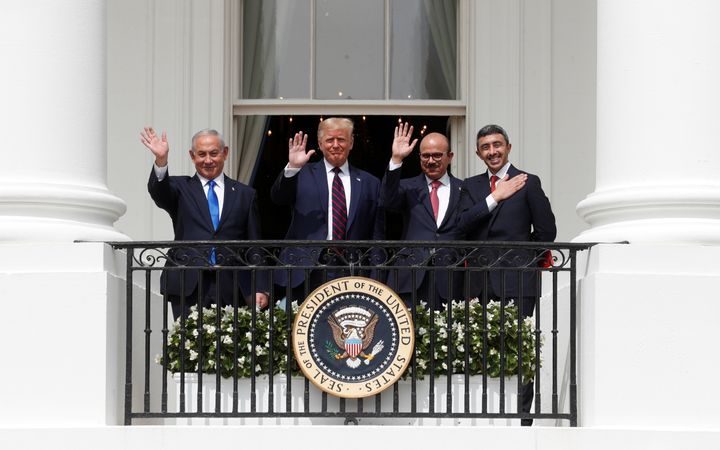 Israel's Prime Minister Benjamin Netanyahu, U.S. President Donald Trump, Bahrain's Foreign Minister Abdullatif Al Zayani and United Arab Emirates Foreign Minister Abdullah bin Zayed wave from the White House balcony after a signing ceremony for the Abraham Accords in Washington, D.C., Sept. 15.