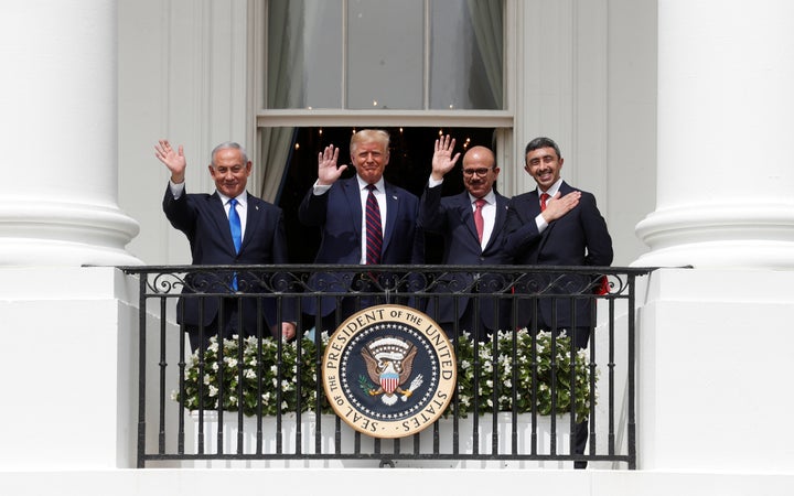 Israel's Prime Minister Benjamin Netanyahu, U.S. President Donald Trump, Bahrain's Foreign Minister Abdullatif Al Zayani and