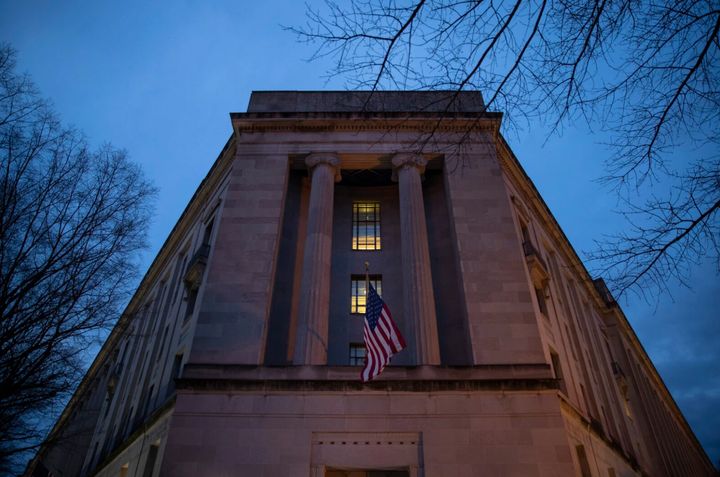 An email sent Friday by an official in the Department of Justice’s Public Integrity Section announced “an exception to the general non-interference with elections policy.” (Drew Angerer/Getty Images)