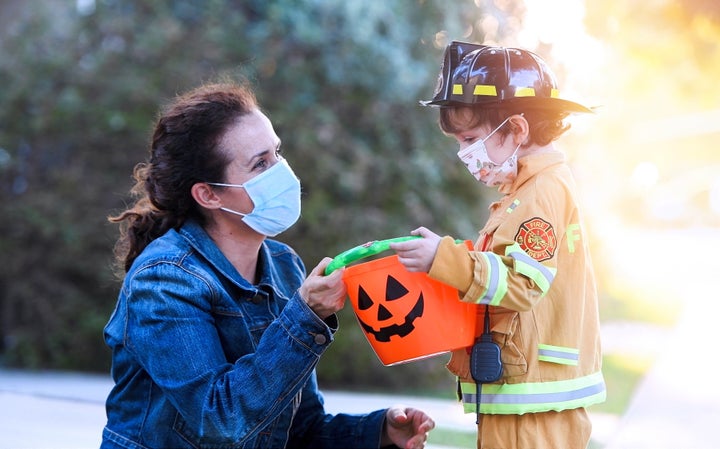 If you decide to trick-or-treat, face masks are a must. 