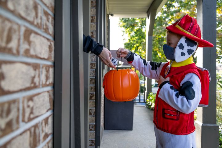 Public health experts are discouraging traditional trick-or-treating but have also offered advice for making the activity less risky. 