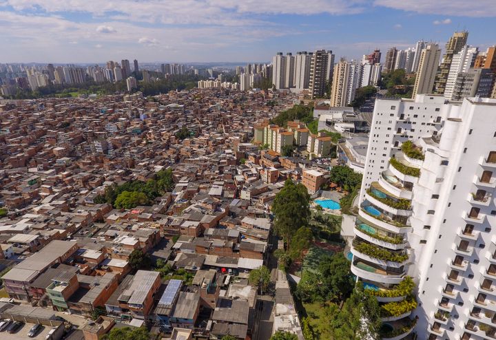 In this aerial photo of Sao Paulo, Brazil, the Paraisópolis Slum sits next to Morumbi, a wealthy neighbourhood of high-rise towers. The world's richest people have seen their wealth soar during the COVID-19 pandemic, even as a new report predicts an additional 150 million could fall into poverty by the end of next year.