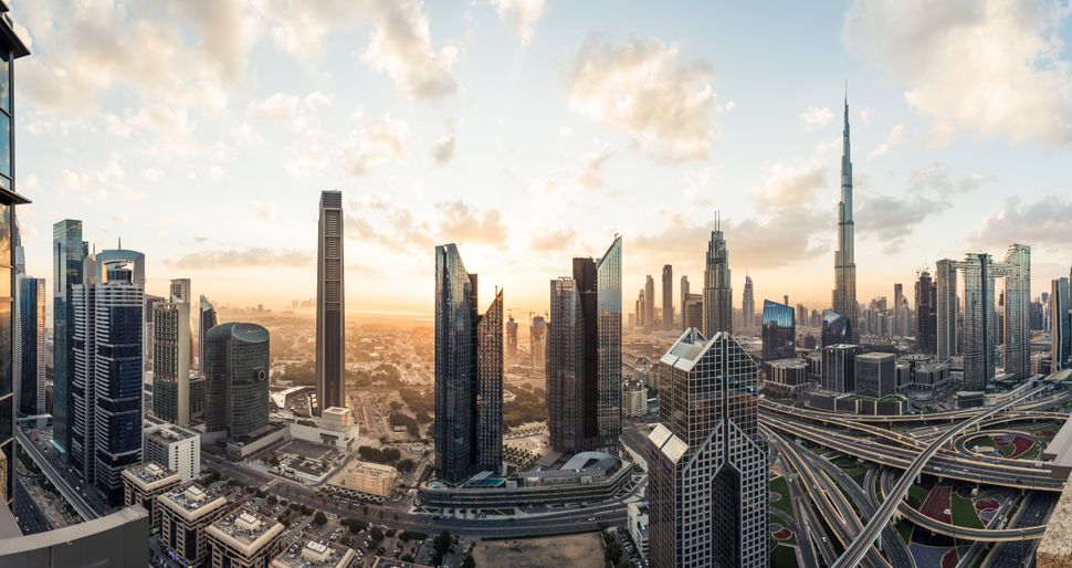 Panoramic View of Dubai Skyline at Sunrise