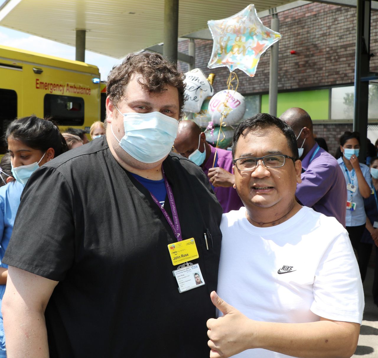 A&E nurse consultant John Ross with nurse Franco Palo, who survived coronavirus earlier this year 