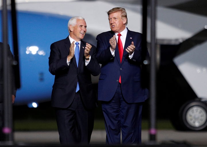 President Donald Trump and Vice President Mike Pence arrive at a campaign rally in Newport News, Virginia, on Sept. 25.