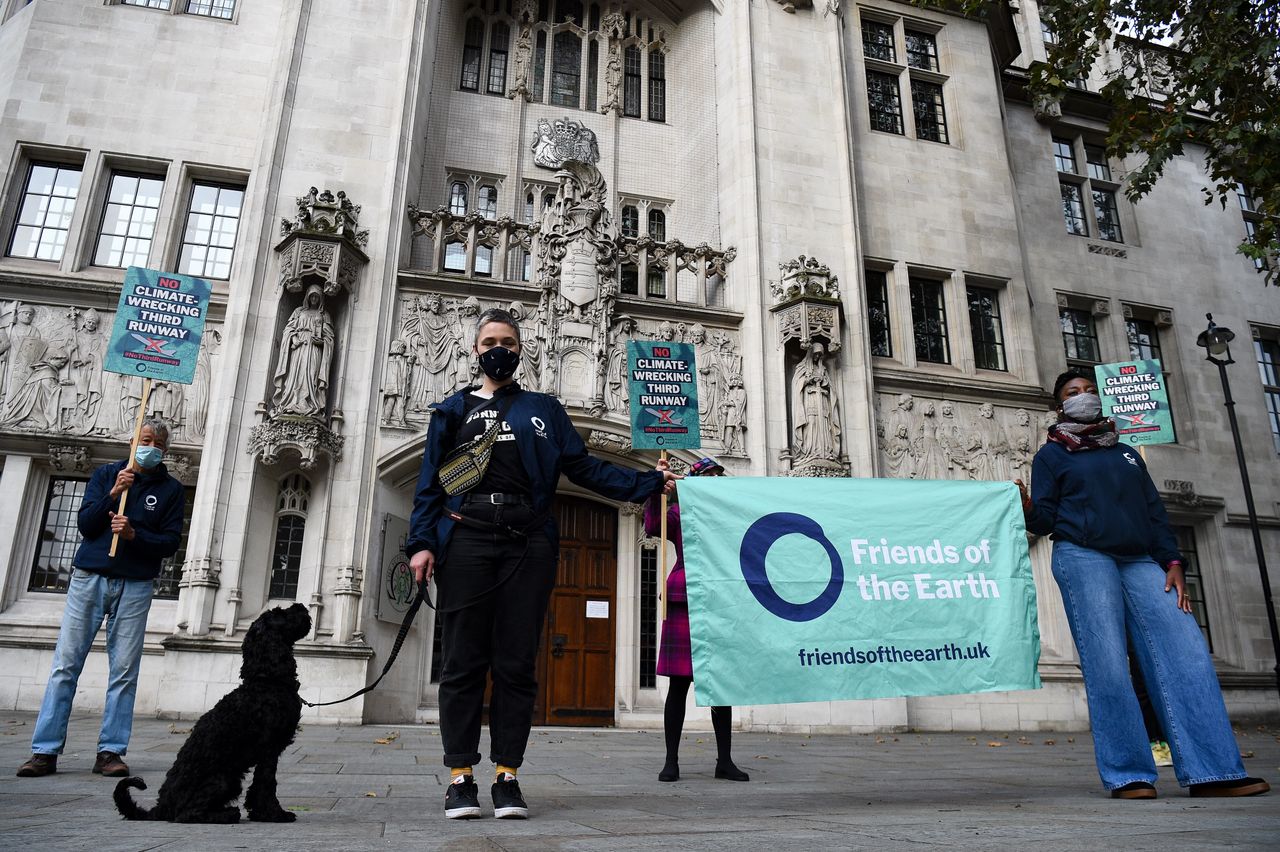 Friends of the Earth campaigners, pictured here outside the Royal Courts of Justice, London.