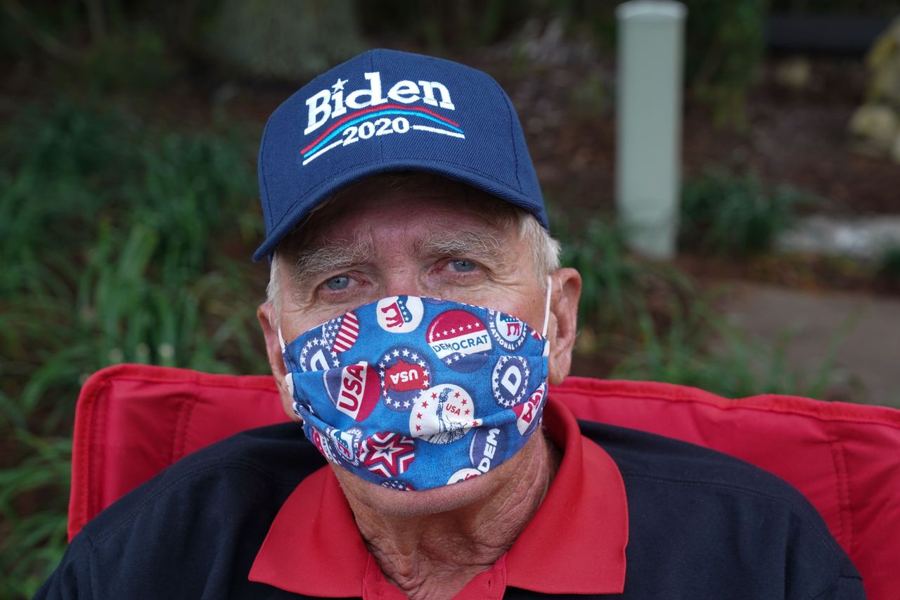 Ed McGinty, a 71-year old retiree from Philadelphia, wears a Biden 2020 hat on July 23. As Trump's popularity plummets among senior citizens, he has scrambled to issue last-minute executive orders aimed at lowering drug prices.