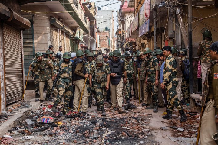 Indian paramilitary forces patrol in the majority community in a riot- affected area on February 28, 2020 in New Delhi, India. 