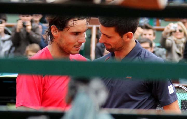Rafael Nadal of Spain (L) shakes hands with Novak Djokovic in a file photo 