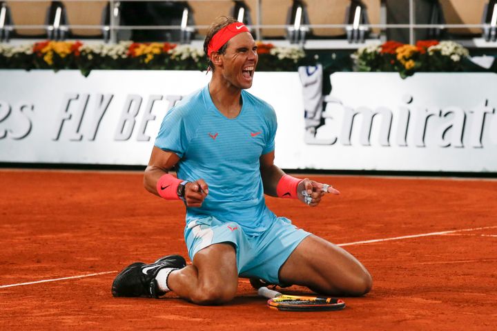 Spain's Rafael Nadal celebrates winning the final match of the French Open tennis tournament against Serbia's Novak Djokovic in three sets, 6-0, 6-2, 7-5, at the Roland Garros stadium in Paris, France, Sunday, Oct. 11, 2020. (AP Photo/Michel Euler)