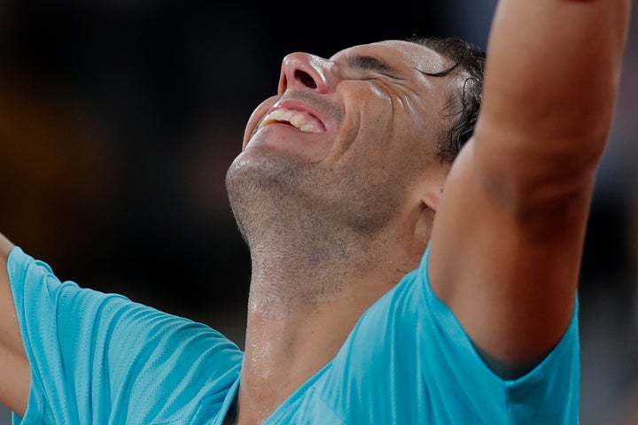 Spain's Rafael Nadal celebrates winning the final match of the French Open tennis tournament against Serbia's Novak Djokovic