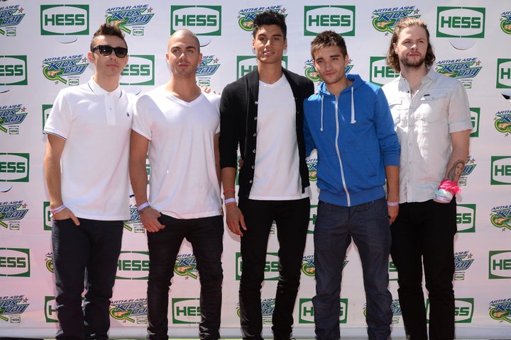 Tom with The Wanted bandmates Nathan Sykes, Max George, Siva Kaneswaran and Jay McGuiness in 2013