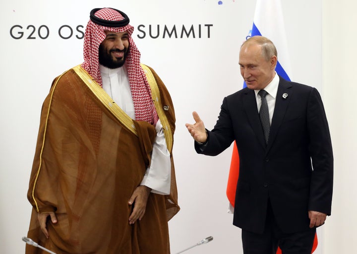 Russian President Vladimir Putin and de facto Saudi ruler Crown Prince Mohammed bin Salman at the G-20 summit in Osaka, Japan
