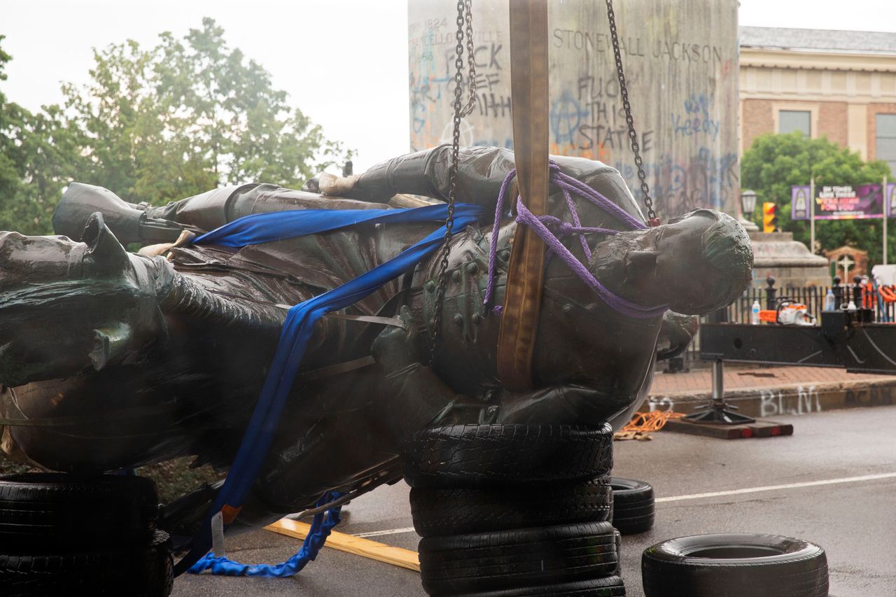 The Stonewall Jackson statue is removed from Monument Avenue in Richmond, Virginia, on July 1. Workers in Richmond removed the statue of Thomas "Stonewall" Jackson, a Confederate general, after the city's mayor ordered the "immediate removal" of Confederate monuments.