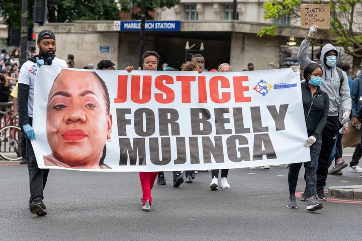 Protesters hold a banner demanding Justice for Belly Mujinga during the Black Lives Matter protest at Hyde Park
