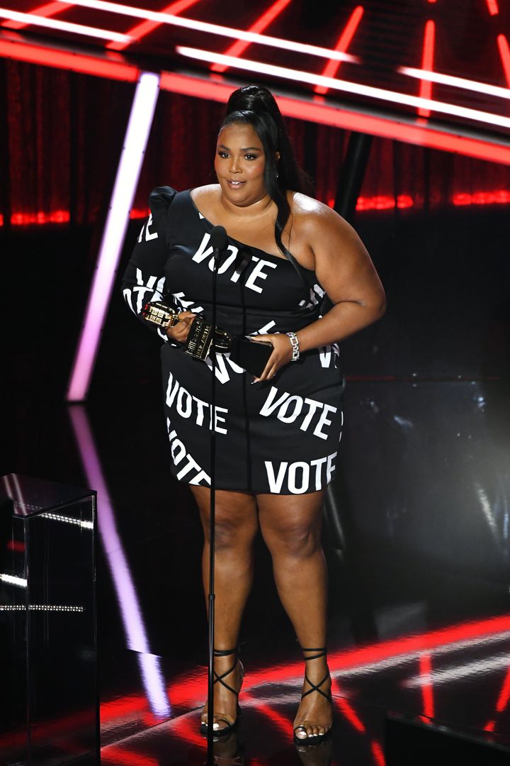 Lizzo accepts the Top Song Sales Artist honor at the 2020 Billboard Music Awards on Wednesday in Los Angeles.