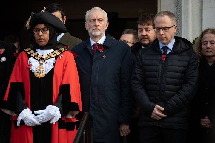(Front, left to right) Rakhia Ismail with then-Labour leader and Islington North MP Jeremy Corbyn and Islington Council leader Richard Watts at the Armistice Day Commemoration at Islington Town Hall last year.