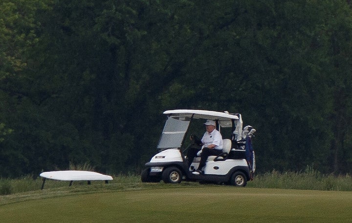 Amid the coronavirus pandemic, President Donald Trump takes a break at the Trump National Golf Course in Sterling, Virginia, on May 24, 2020.