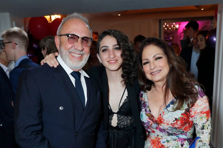 Emily Estefan (middle) with her parents, Emilio and Gloria Estefan. 