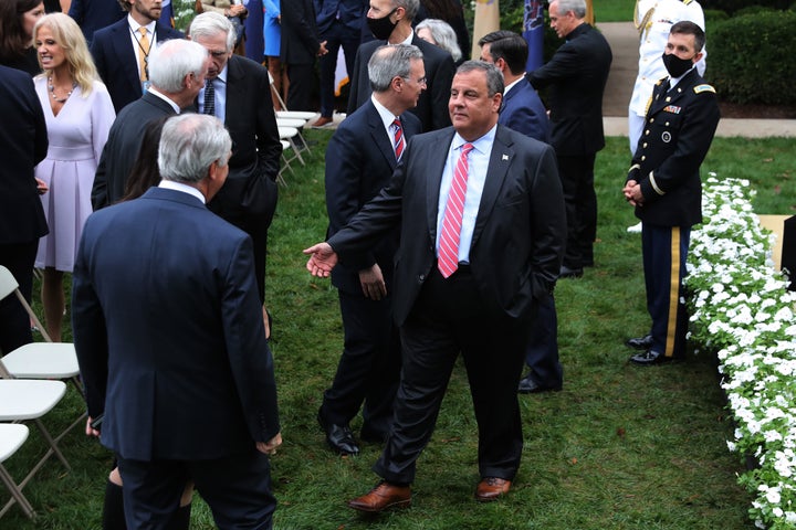 Former New Jersey Gov. Chris Christie (center) talks with guests in the Rose Garden after President Donald Trump introduced 7th U.S. Circuit Court Judge Amy Coney Barrett, 48, as his nominee to the Supreme Court at the White House on Sept. 26.