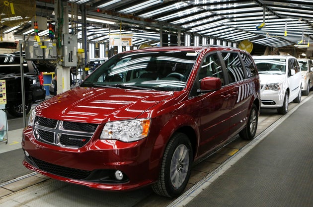 Fiat Chrysler's Dodge minivans on the assembly line in Windsor, Ont., Feb. 9, 2015. The company has reached a deal to invest $1.5 billion in new manufacturing in Canada, union Unifor says.