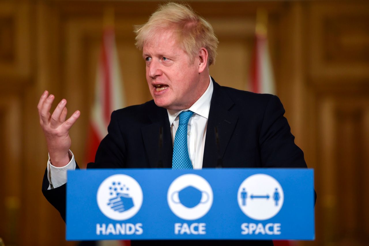 Boris Johnson speaks during a press conference ahead of the imposition of tighter restrictions in some parts of England