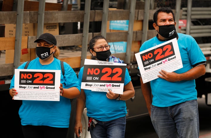 Members of the Mobile Workers Alliance held a demonstration in Los Angeles earlier this month, urging voters to vote against Prop 22.