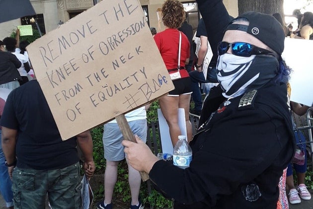 Justin Coffman at a protest against police brutality after the May 25 death of George