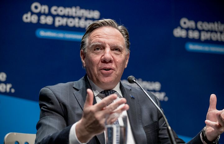 Quebec Premier Francois Legault responds to a question during a new conference in Montreal on Thursday.