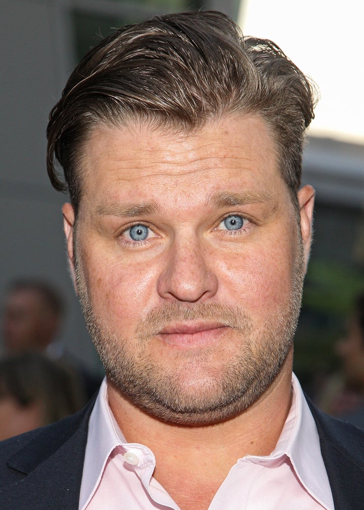 Actor Zachery Ty Bryan arrives at the premiere of "Dark Tourist" in August 2013.