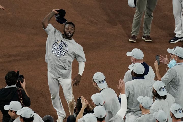 Tampa Bay Rays left fielder Randy Arozarena celebrates his MVP award following their victory against the Houston Astros in Game 7 of a baseball American League Championship Series, Saturday, Oct. 17, 2020, in San Diego. The Rays defeated the Astros 4-2 to win the series 4-3 games. (AP Photo/Jae C. Hong)