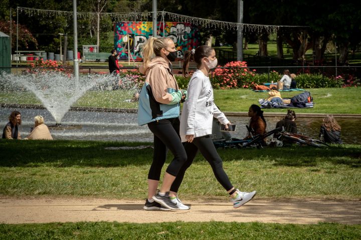 People exercise in Princes Park on October 18, 2020 in Melbourne, Australia. 