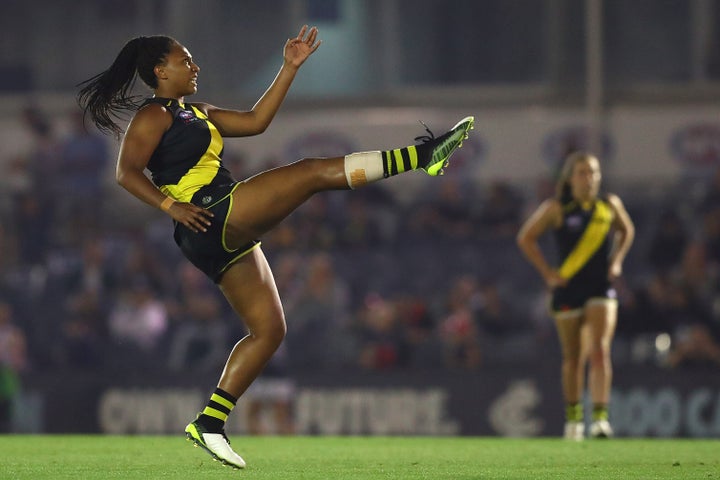 Sabrina Frederick of the Tigers kicks a goal during the round one AFLW match between the Richmond Tigers and the Carlton Blues at Ikon Park on February 07, 2020 in Melbourne.