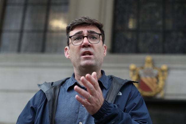 Greater Manchester mayor Andy Burnham speaking to the media outside the Central Library in Manchester on Thursday