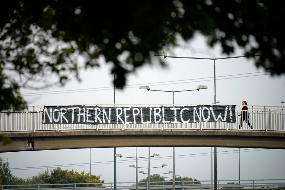 A banner calling for a 'Northern Republic Now' hangs from a pedestrian bridge over Princes Park Way on October 19.