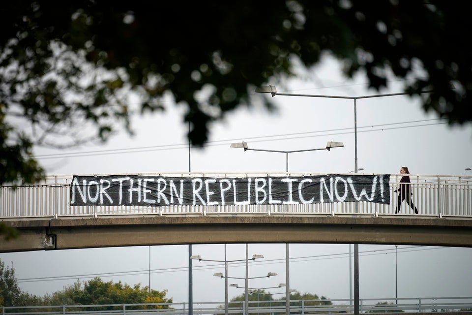 A banner calling for a 'Northern Republic Now' hangs from a pedestrian bridge over Princes Park Way on October 19.