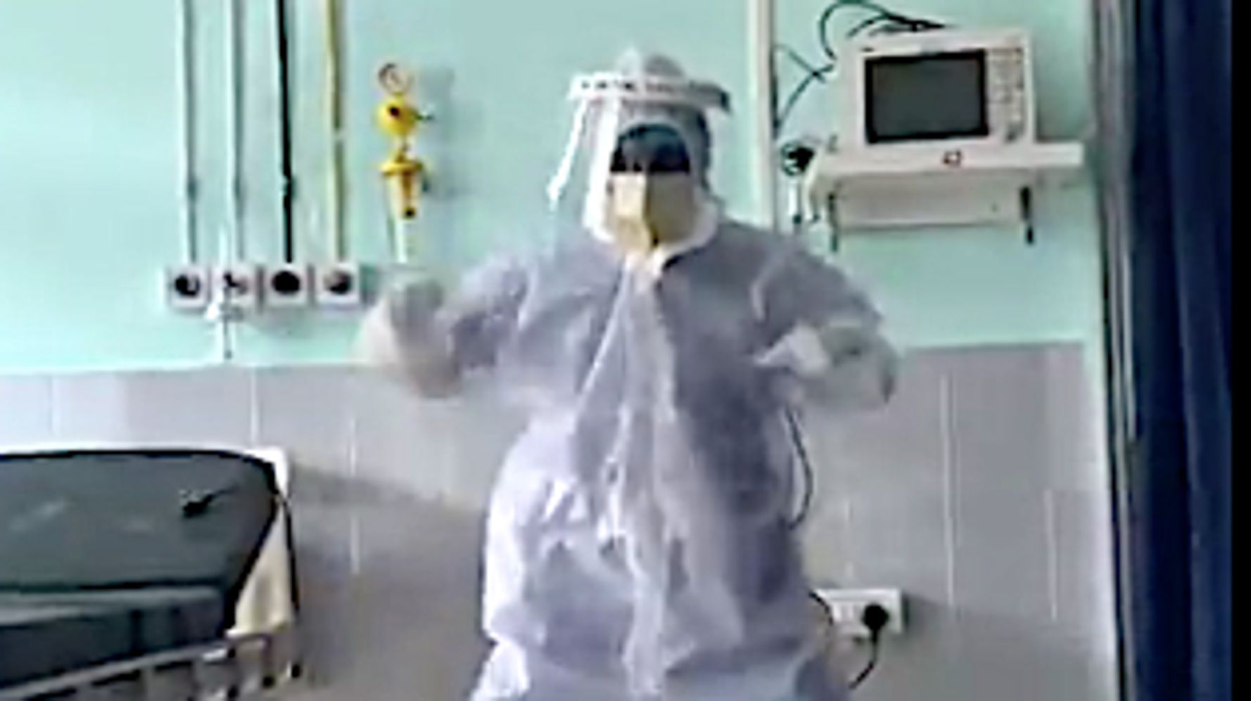 Dancing In The Dark: Doctor Cheers Up COVID-19 Patients By Busting Moves In Med Gear