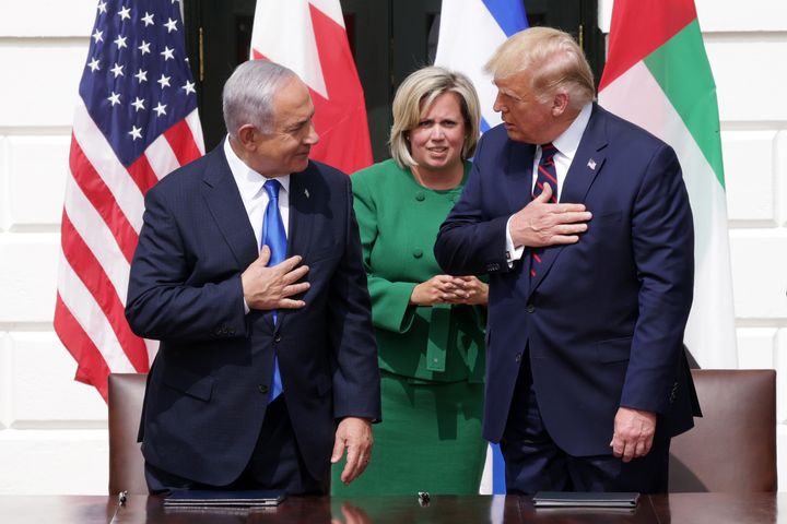 Cam Henderson (center) is the chief of protocol at the State Department, attending high-profile events like the White House ceremony in September at which Bahrain and the United Arab Emirates agreed to recognize Israel. 