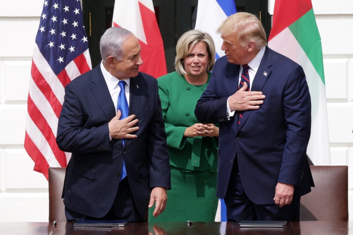 Cam Henderson (center) is the chief of protocol at the State Department, attending high-profile events like the White House ceremony in September at which Bahrain and the United Arab Emirates agreed to recognize Israel.