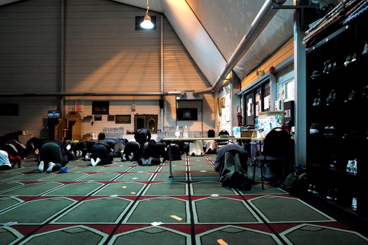 Muslim faithful pray inside the Pantin mosque on Tuesday. Since the attack, operations targeting structures or people suspect