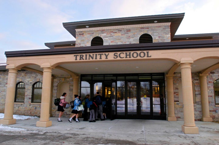 Students head into class for the first time on Jan. 14, 2008 at Trinity School at River Ridge's campus in Eagan, Minn. 