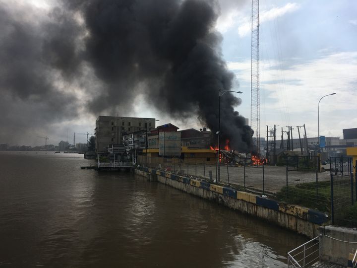 A building on fire near the Lekki-Ikoyi Toll Gate in Lagos on 21 October, 2020.