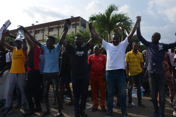 Protesters march at Alausa Secretariat in Ikeja, Lagos State, during a peaceful demonstration against police brutality in Nigeria on Oct. 20.