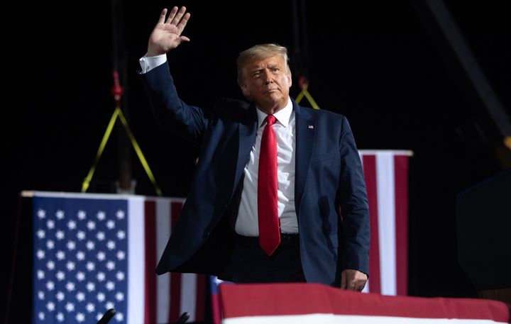 US President Donald Trump waves at the end of a reelection campaign rally Wednesday in North Carolina.