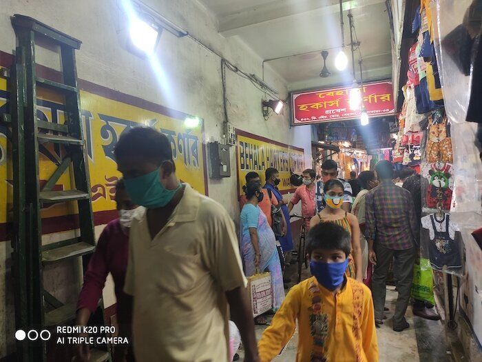People at the Behala Hawker's Corner Market in Kolkata