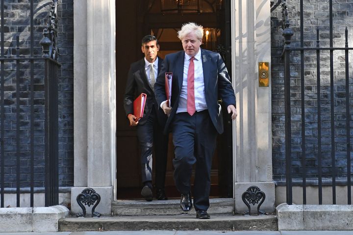 Chancellor of the Exchequer Rishi Sunak (left) and Prime Minister Boris Johnson leave 10 Downing Street