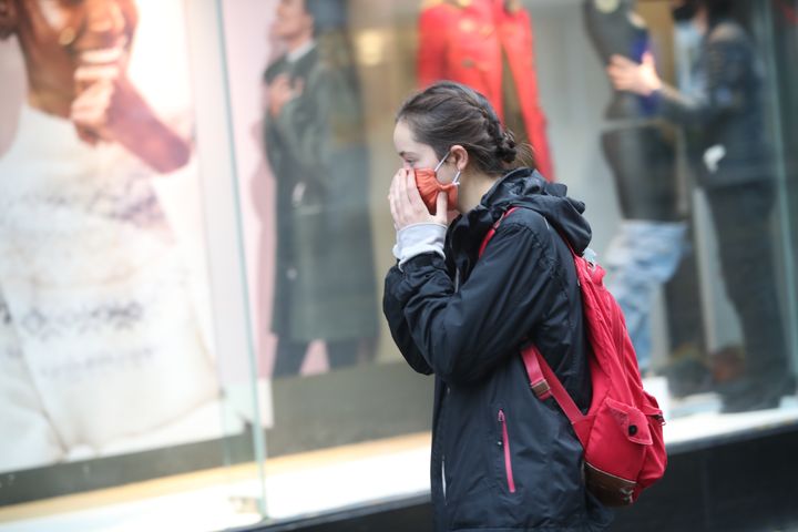 A woman wearing a face mask in Sheffield city centre, as South Yorkshire becomes the latest region to be placed into tier 3 coronavirus restrictions, which will come into effect on Saturday