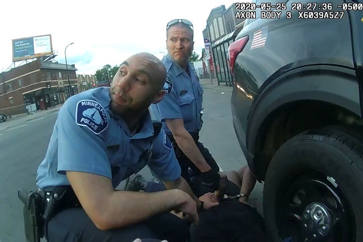 Video taken from an officer's body camera video shows George Floyd being kneeled upon by Chauvin, who's next to Kueng.