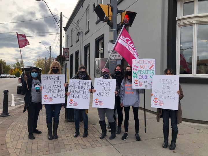 Glen Hill Marnwood's laid-off staff demonstrate in downtown Bowmanville Wednesday.