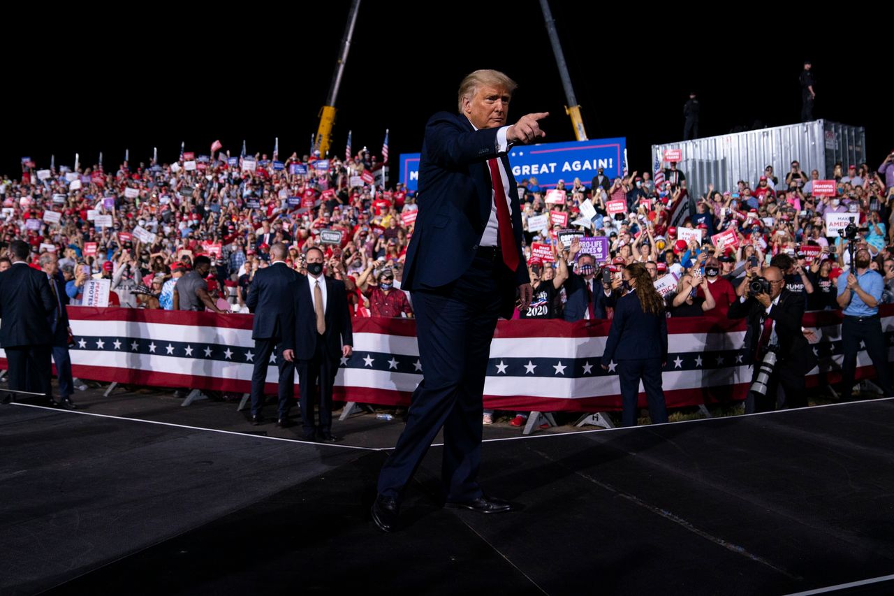President Donald Trump points to the crowd as he walks off stage after speaking at a campaign rally at Gastonia Municipal Airport, Wednesday, Oct. 21, 2020, in Gastonia, N.C. (AP Photo/Evan Vucci)